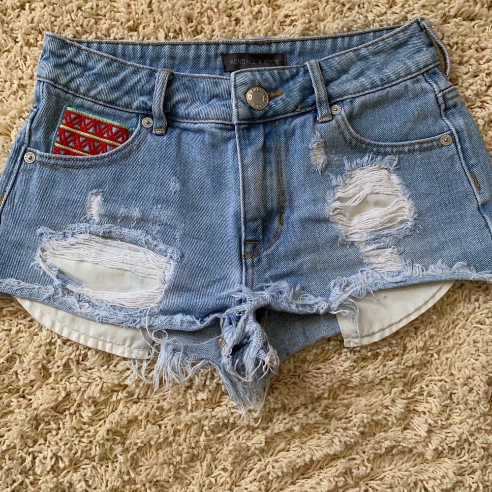 Kendall and Kylie cut off jean shorts